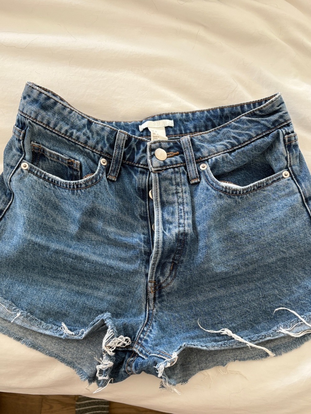 H&M Distressed Mid-Blue Denim Cutoff Shorts